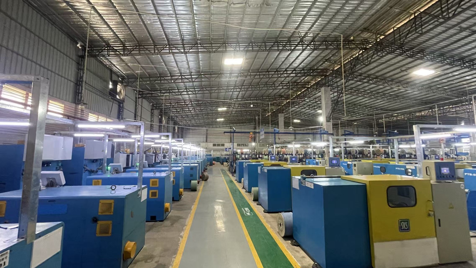 Wide view across the NexBridge cable factory floor